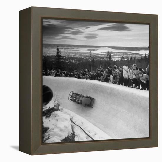 Bobsled Racing by on a Big Vendleboe Curve During the Winter Olympics-Nat Farbman-Framed Premier Image Canvas