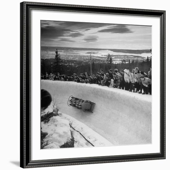 Bobsled Racing by on a Big Vendleboe Curve During the Winter Olympics-Nat Farbman-Framed Premium Photographic Print