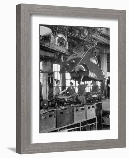 Body Being Lowered on to "Topolino" Chassis by Workers on Assembly Line at Fiat Production Plant-Alfred Eisenstaedt-Framed Photographic Print