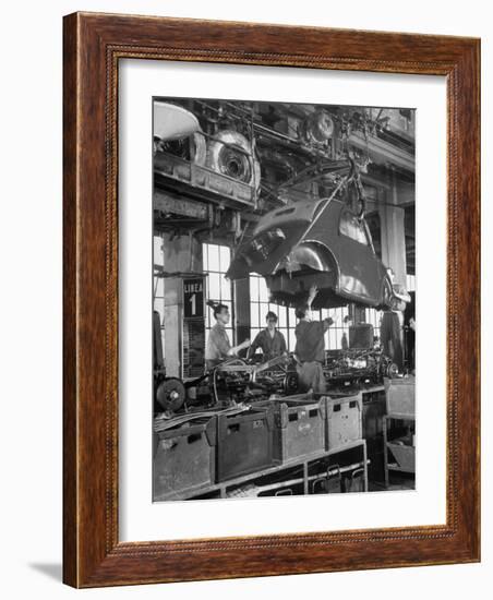 Body Being Lowered on to "Topolino" Chassis by Workers on Assembly Line at Fiat Production Plant-Alfred Eisenstaedt-Framed Photographic Print