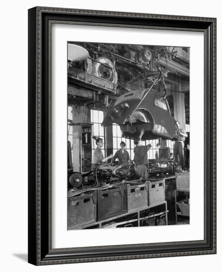 Body Being Lowered on to "Topolino" Chassis by Workers on Assembly Line at Fiat Production Plant-Alfred Eisenstaedt-Framed Photographic Print