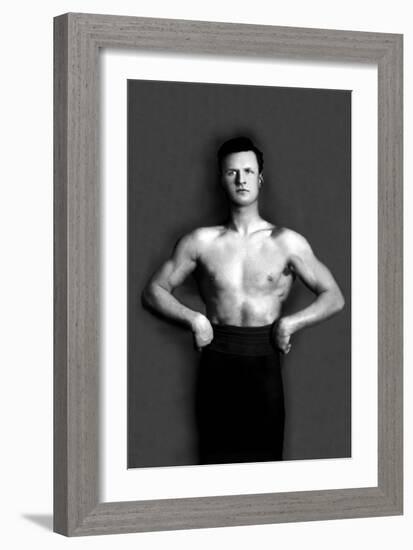 Bodybuilder in Pants with Bared Torso-null-Framed Art Print