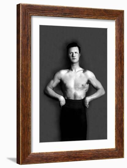 Bodybuilder in Pants with Bared Torso-null-Framed Art Print