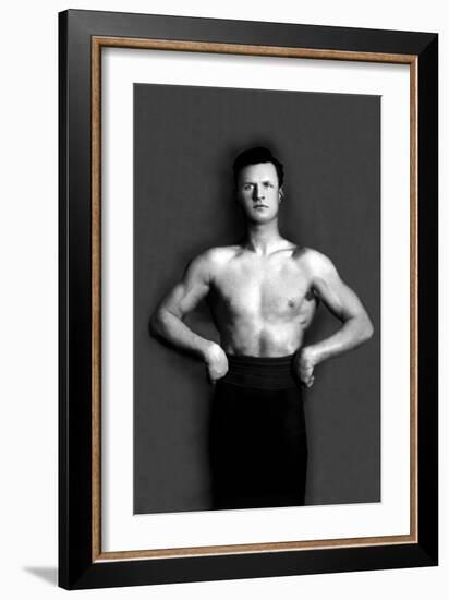 Bodybuilder in Pants with Bared Torso-null-Framed Art Print