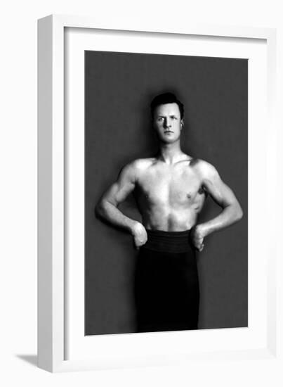 Bodybuilder in Pants with Bared Torso-null-Framed Art Print