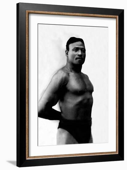 Bodybuilder's Shadowed Torso-null-Framed Art Print