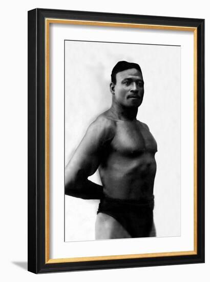 Bodybuilder's Shadowed Torso-null-Framed Art Print