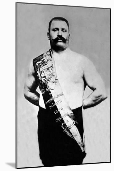 Bodybuilder Wearing Bandolier of Victory-null-Mounted Art Print