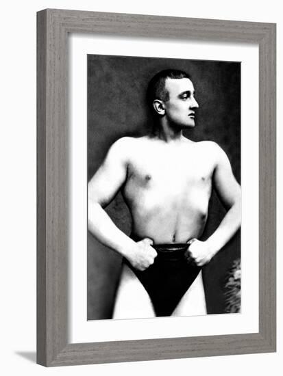 Bodybuilder with Thumbs Tucked in Belt-null-Framed Art Print