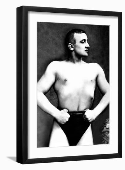 Bodybuilder with Thumbs Tucked in Belt-null-Framed Art Print