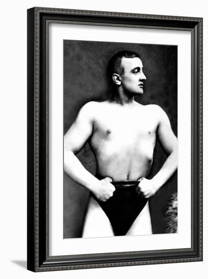 Bodybuilder with Thumbs Tucked in Belt-null-Framed Art Print