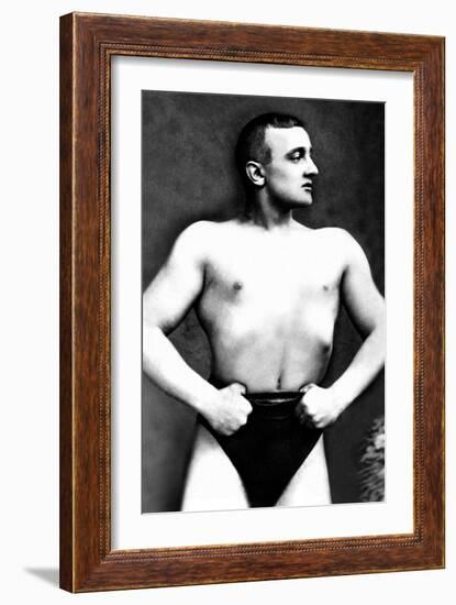 Bodybuilder with Thumbs Tucked in Belt-null-Framed Art Print