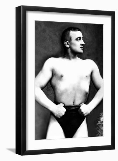 Bodybuilder with Thumbs Tucked in Belt-null-Framed Art Print