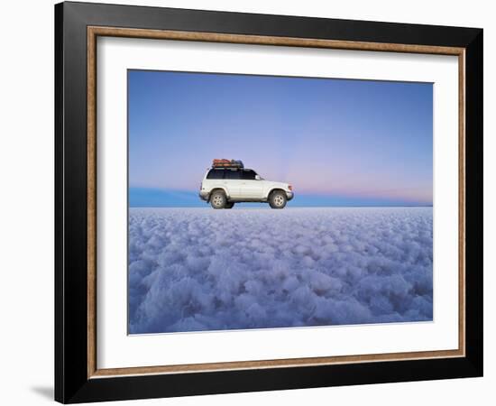 Bolivia, Potosi Department, Daniel Campos Province, White Toyota Landcruiser on the Salar de Uyuni,-Karol Kozlowski-Framed Photographic Print