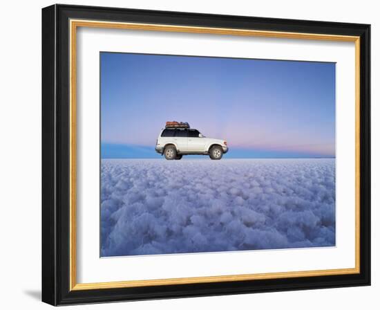 Bolivia, Potosi Department, Daniel Campos Province, White Toyota Landcruiser on the Salar de Uyuni,-Karol Kozlowski-Framed Photographic Print