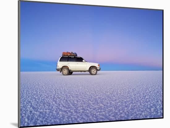 Bolivia, Potosi Department, Daniel Campos Province, White Toyota Landcruiser on the Salar de Uyuni,-Karol Kozlowski-Mounted Photographic Print