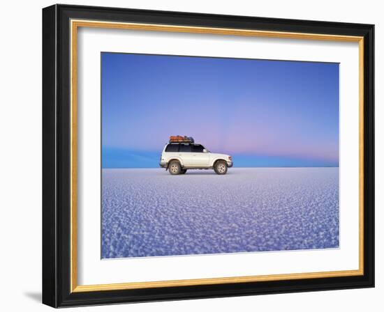 Bolivia, Potosi Department, Daniel Campos Province, White Toyota Landcruiser on the Salar de Uyuni,-Karol Kozlowski-Framed Photographic Print