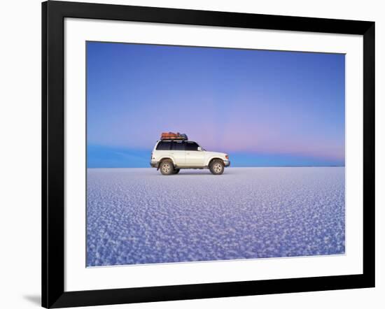 Bolivia, Potosi Department, Daniel Campos Province, White Toyota Landcruiser on the Salar de Uyuni,-Karol Kozlowski-Framed Photographic Print