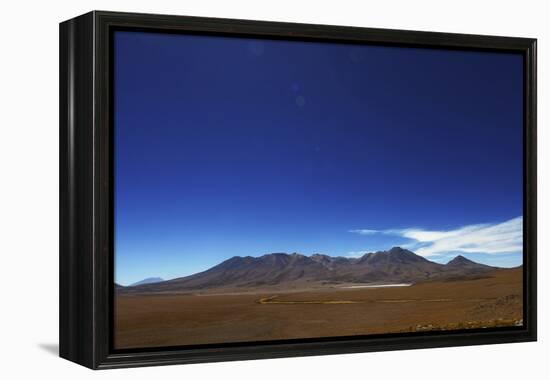 Bolivian desert, Bolivia. Arid landscape going toward lake and mountains.-Anthony Asael-Framed Premier Image Canvas