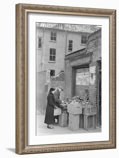 Bombed out Greengrocer's store. 26th April 1941-Staff-Framed Photographic Print