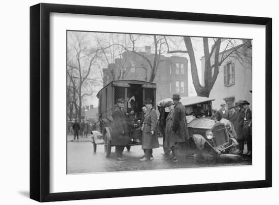 Bootleggers Carted Off to Prison after their Car Was Wrecked in a Police Chase-null-Framed Art Print