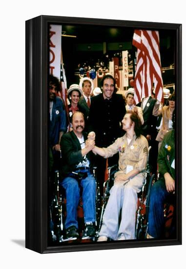 BORN ON THE FOURTH OF JULY, 1989 directed by OLIVER STONE On the set, Oliver Stone between Ron Kovi-null-Framed Stretched Canvas