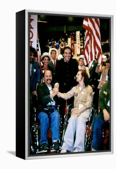 BORN ON THE FOURTH OF JULY, 1989 directed by OLIVER STONE On the set, Oliver Stone between Ron Kovi-null-Framed Stretched Canvas