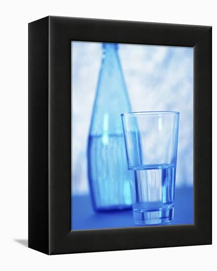 Bottle and glass of water-null-Framed Premier Image Canvas