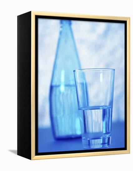 Bottle and glass of water-null-Framed Premier Image Canvas