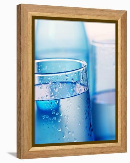 Bottle and glasses of water-null-Framed Premier Image Canvas