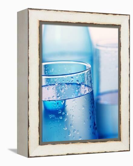 Bottle and glasses of water-null-Framed Premier Image Canvas