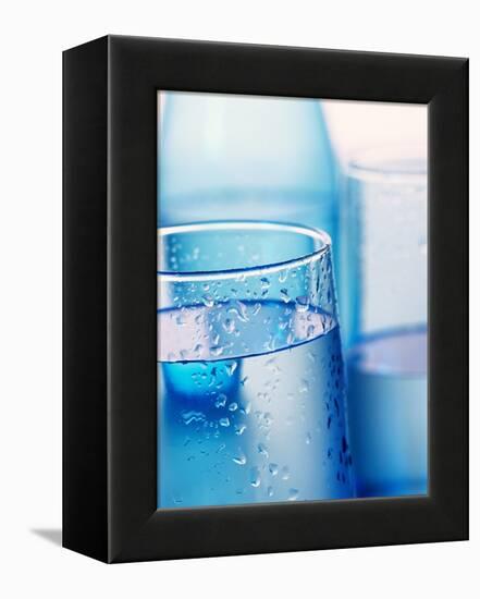 Bottle and glasses of water-null-Framed Premier Image Canvas