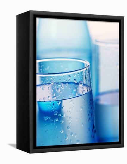 Bottle and glasses of water-null-Framed Premier Image Canvas