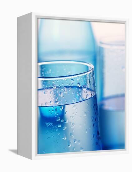 Bottle and glasses of water-null-Framed Premier Image Canvas