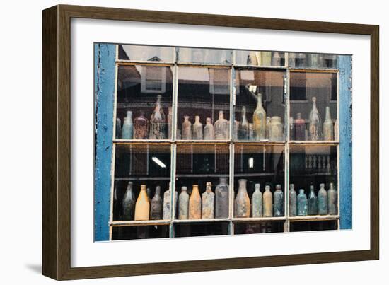 Bottles In New Orleans Louisiana Storefront-null-Framed Photo