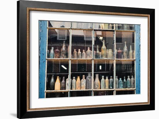 Bottles In New Orleans Louisiana Storefront-null-Framed Photo