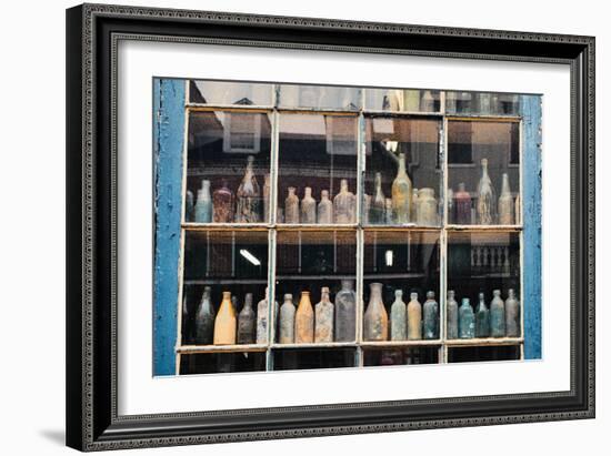 Bottles In New Orleans Louisiana Storefront-null-Framed Photo