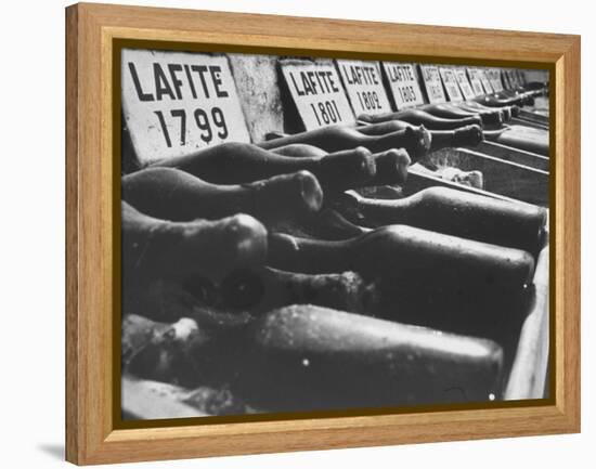 Bottles of Lafite Wines, Now Museum Pieces in French Wine Cellar-Carlo Bavagnoli-Framed Premier Image Canvas