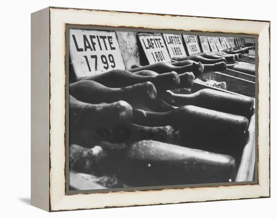 Bottles of Lafite Wines, Now Museum Pieces in French Wine Cellar-Carlo Bavagnoli-Framed Premier Image Canvas