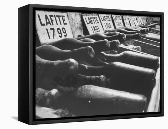 Bottles of Lafite Wines, Now Museum Pieces in French Wine Cellar-Carlo Bavagnoli-Framed Premier Image Canvas