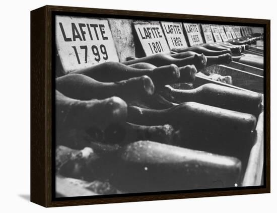 Bottles of Lafite Wines, Now Museum Pieces in French Wine Cellar-Carlo Bavagnoli-Framed Premier Image Canvas