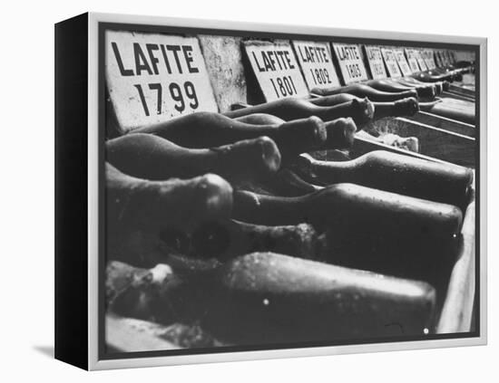 Bottles of Lafite Wines, Now Museum Pieces in French Wine Cellar-Carlo Bavagnoli-Framed Premier Image Canvas