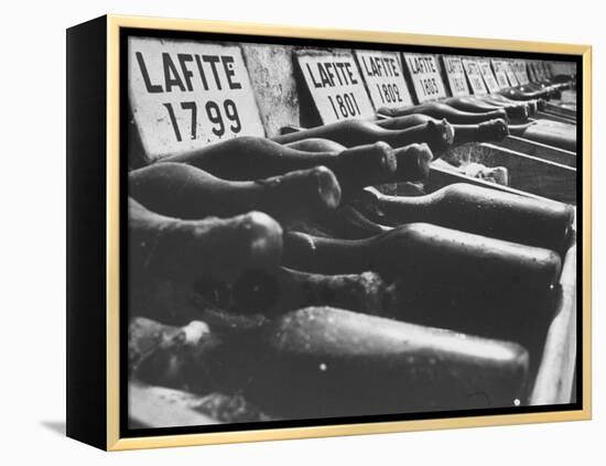 Bottles of Lafite Wines, Now Museum Pieces in French Wine Cellar-Carlo Bavagnoli-Framed Premier Image Canvas