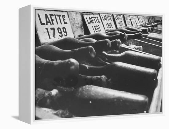 Bottles of Lafite Wines, Now Museum Pieces in French Wine Cellar-Carlo Bavagnoli-Framed Premier Image Canvas