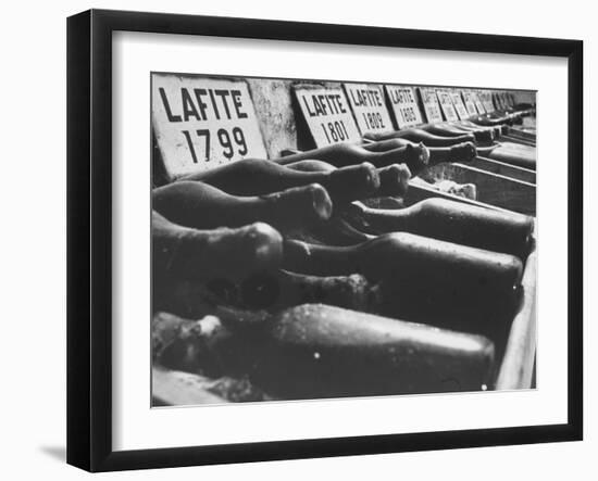 Bottles of Lafite Wines, Now Museum Pieces in French Wine Cellar-Carlo Bavagnoli-Framed Photographic Print