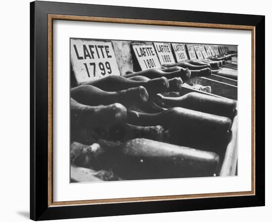 Bottles of Lafite Wines, Now Museum Pieces in French Wine Cellar-Carlo Bavagnoli-Framed Photographic Print