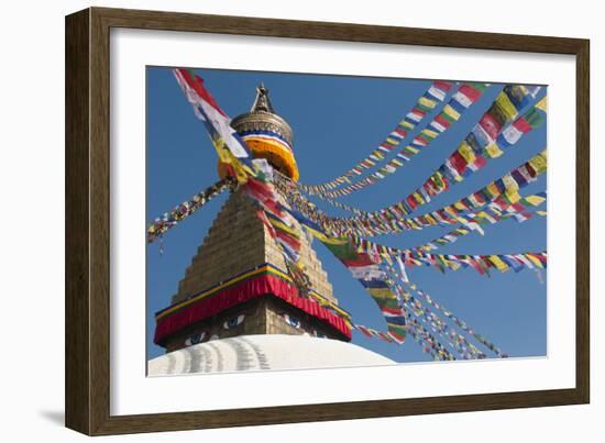 Bouddha (Boudhanath) (Bodnath) in Kathmandu is covered in colourful prayer flags, Kathmandu, Nepal-Alex Treadway-Framed Photographic Print