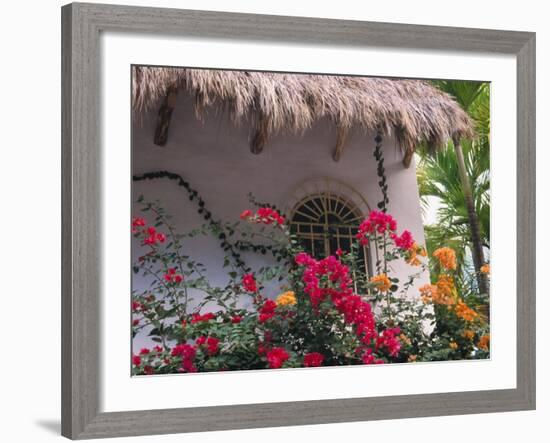 Bougenvilla Blooms Underneath a Thatch Roof, Puerto Vallarta, Mexico-Merrill Images-Framed Photographic Print