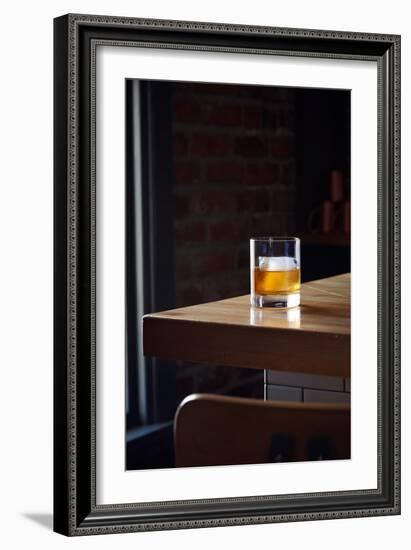 Bourbon In A Short Tumbler Glass On A Bar With A Large Ice Cube In The Glass-Shea Evans-Framed Photographic Print