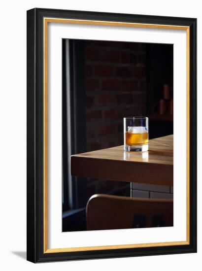 Bourbon In A Short Tumbler Glass On A Bar With A Large Ice Cube In The Glass-Shea Evans-Framed Photographic Print